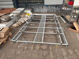 a metal frame that is sitting in the middle of the floor