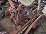 a small tractor with a steering and a small tractor with a steering