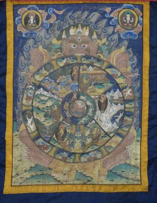 une image représentant une tapisserie sur laquelle figure la roue de la vie