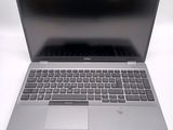 a laptop computer that is sitting on a table