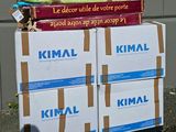 several boxes stacked on top of each other on a sidewalk