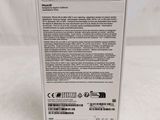 a close up of the back of a white box with a green sticker on it