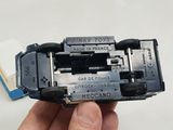 a person holding a small toy car in their hand