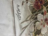 a picture of a picture of some flowers on a table