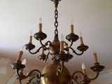 a chandelier hanging from the ceiling in a room