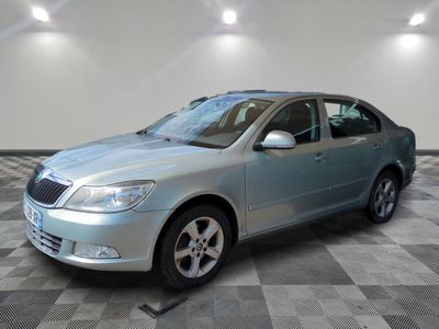 a picture of a silver car parked in a garage