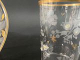 two vases sitting next to each other on a table