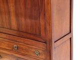 a wooden dresser with a drawer on top of it