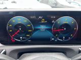 a car dashboard with a digital speedometer and gauges