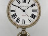 a clock that has roman numerals on the face of it