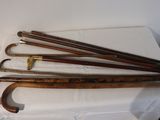 a lot of umbrellas that are sitting on a table