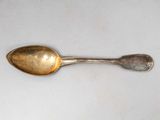 a spoon that is sitting on a table