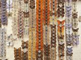 a lot of butterflies that are hanging on the wall