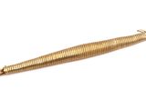 an image of a gold colored metal object on a white surface