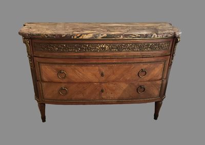 an antique chest of drawers with a marble top on a grey background