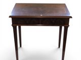 an image of a small wooden table with a drawer underneath it