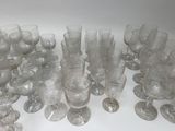 a lot of empty wine glasses on the table