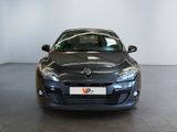the front view of a grey car in a showroom
