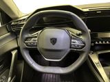 the interior of a car with a steering wheel and dashboard