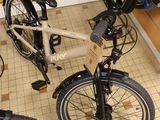 two bikes that are sitting on the floor in the room