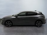 the grey car is parked on the concrete floor in the room