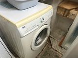 a washer and dryer in a small room