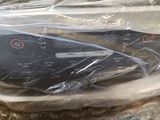 a pair of scissors in a plastic bag on a table