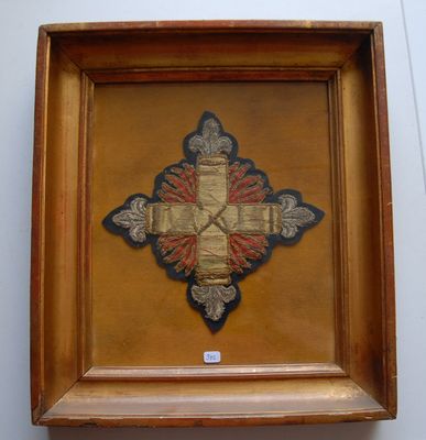an image of a picture of a cross in a wooden frame