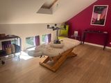 a room with a couch and a table in it