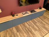a picture of a tv mounted on a wall in a living room