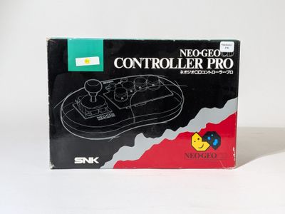 a box with a game controller in it on a table