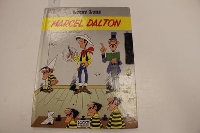 une vieille bande dessinée sur laquelle figurent un marin et d'autres personnages de bande dessinée