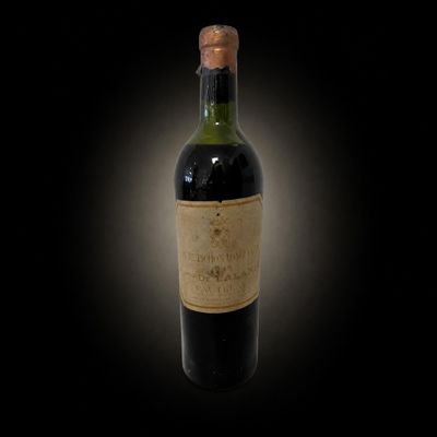 a bottle of wine on a black background