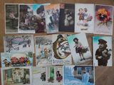 many different pictures of cats and dogs on the table