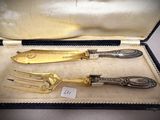 three different types of silverware in a case