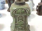 many different vases that are sitting on a table