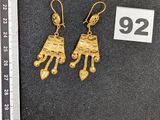 boucles d'oreilles plaquées or représentant un cheval et son cavalier