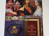 deux livres sur une table avec l'image d'un homme et d'une femme