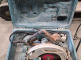 a tool box that has a circular saw in it
