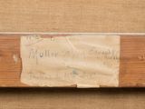 a piece of paper taped to a piece of wood