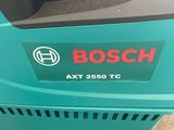 a close up of a bosch vacuum cleaner on a cart