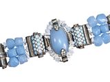 blue and silver bracelet with beads and stones on a white background