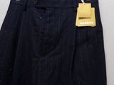 a picture of a skirt hanging on a hanger on a wall
