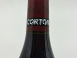 a bottle of wine that is sitting on a table