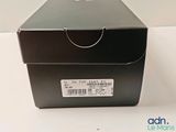 a black box with a label on it on a table