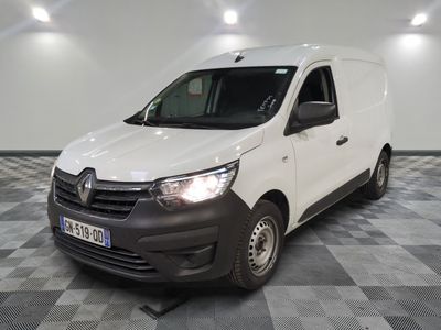 the white van is parked on a checkered floor in a room