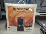 a box of nespresso coffee on the ground