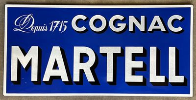 a blue sign that says cognac martell on it