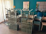 many chairs and tables in a room with blue walls