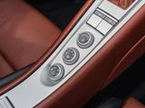 a close up of a car ' s dashboard with buttons and controls